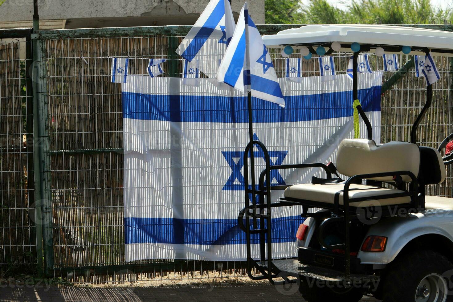 The blue and white flag of Israel with the six-pointed Star of David. photo