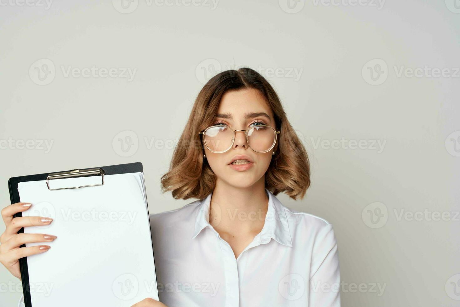 Business woman in white shirt documents manager office work photo