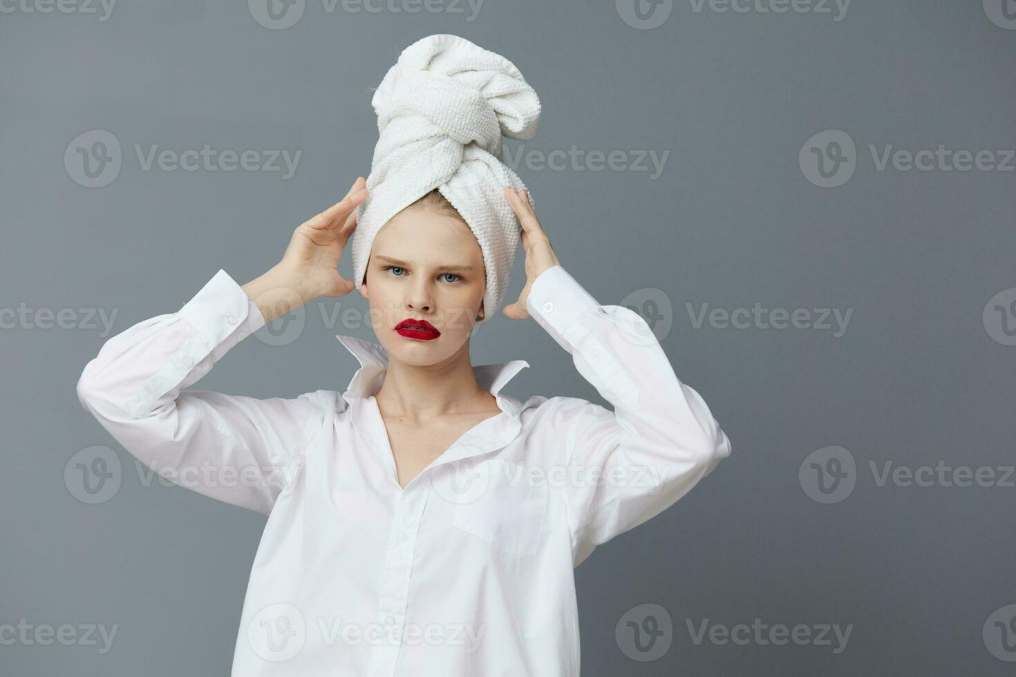 pretty woman red lips towel on head makeup studio model unaltered photo