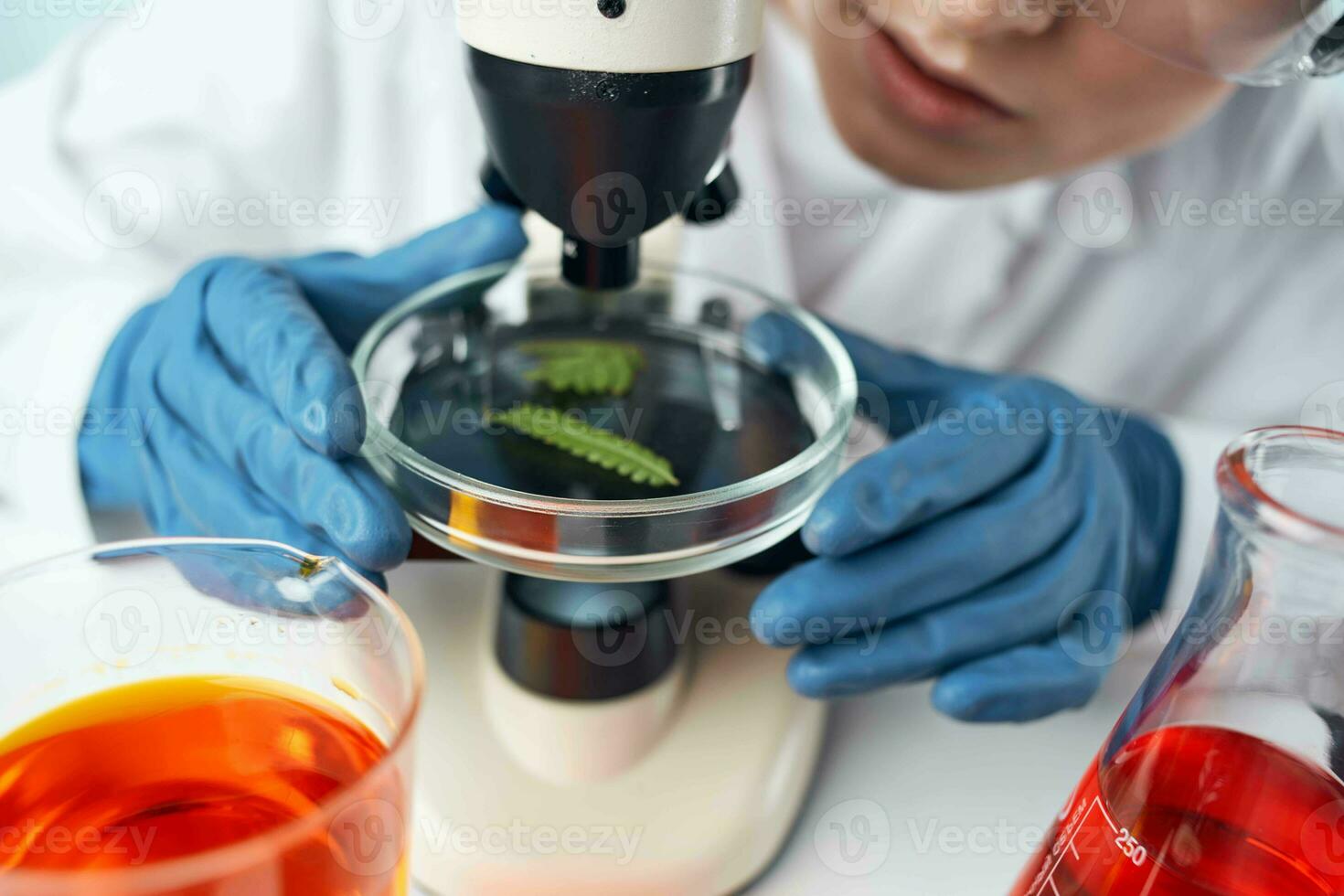 woman laboratory assistant microscope research diagnostics science work photo