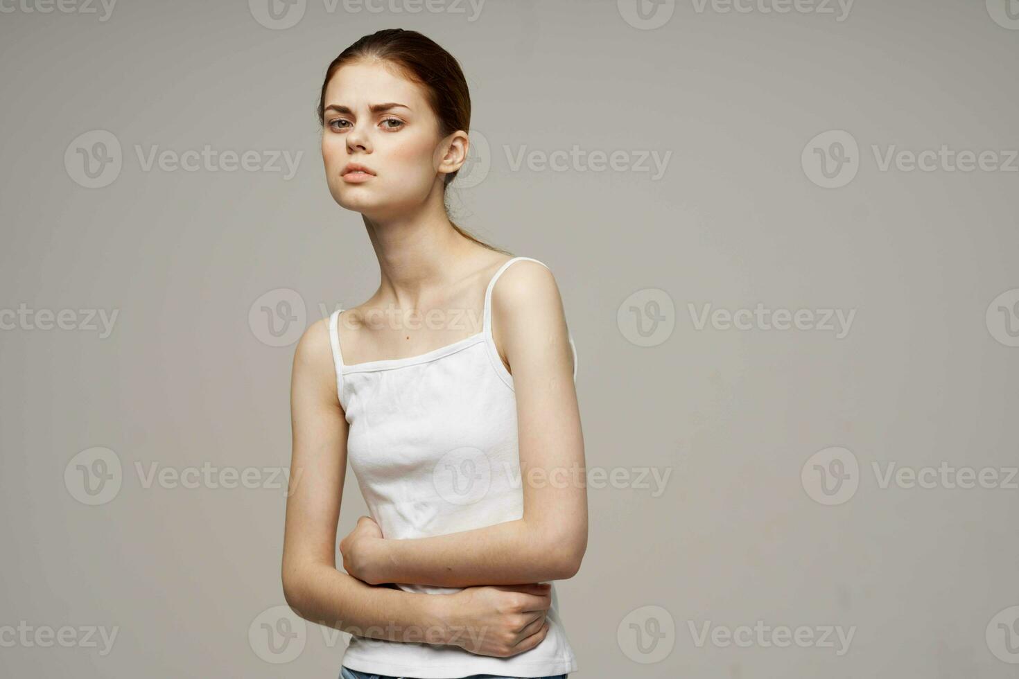woman menstruation health problems gynecology disorder light background photo