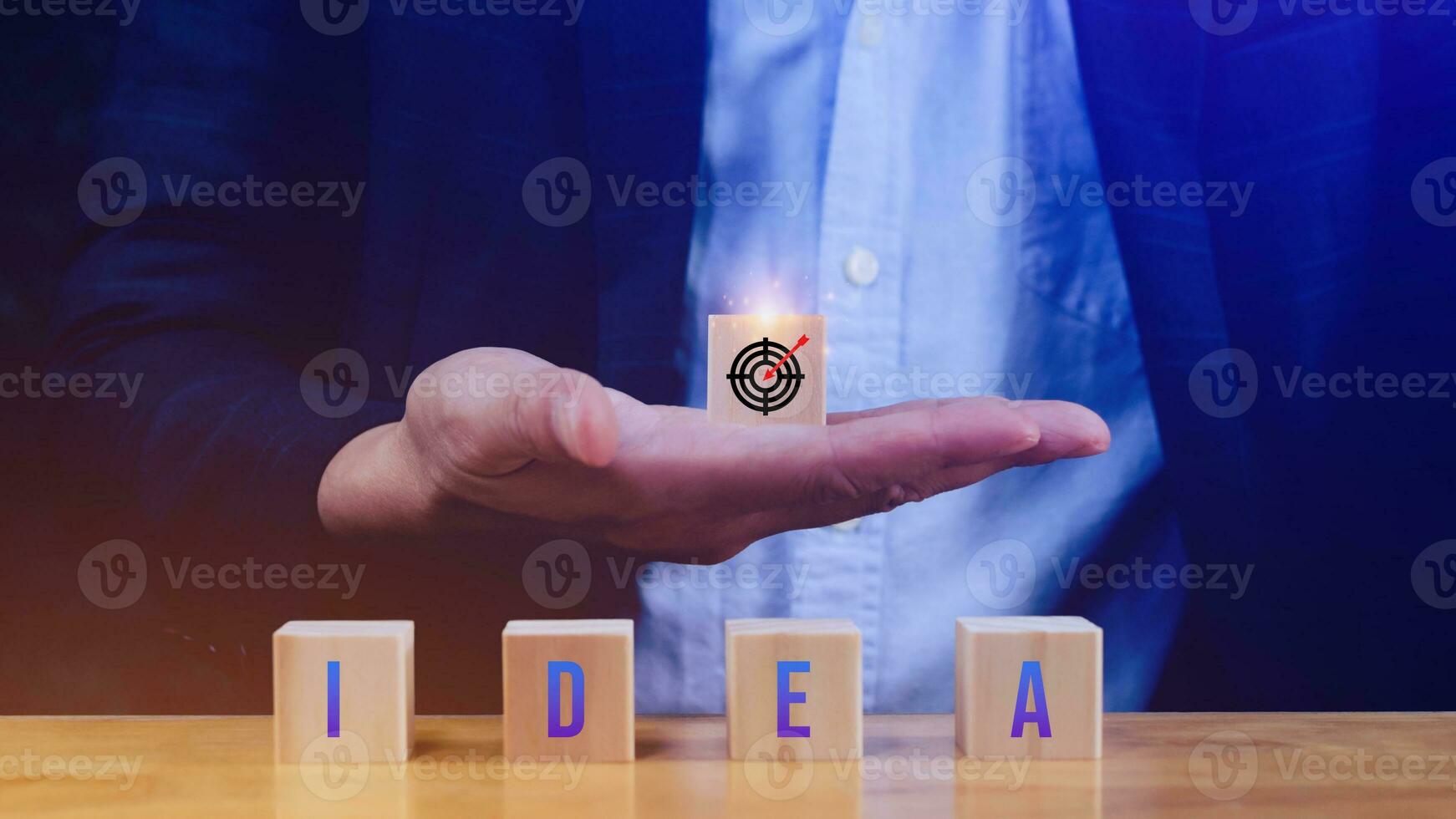 Concept of business planning strategy, Hand choose the wooden cube block with icon aiming goal Action plan and words idea, success and business target concept, company strategy development. photo