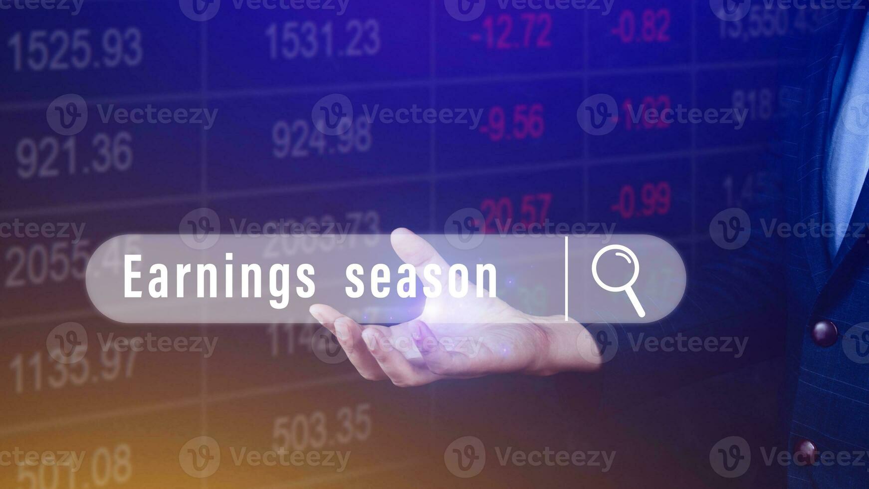 Earnings season, hand holding with written in search bar with the financial data visible on background, Reports Stock Market Ticker photo