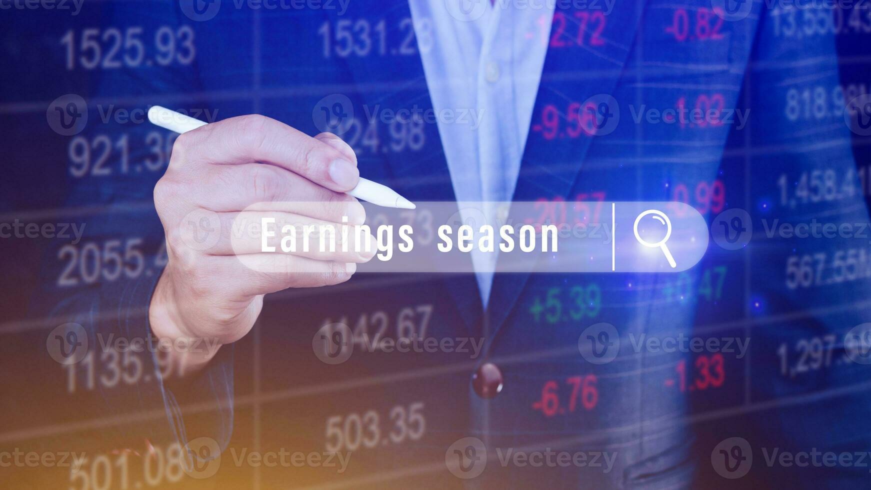Earnings season Hand touching of written in search bar with the financial data visible in the background,  Reports Stock Market Ticker Words photo
