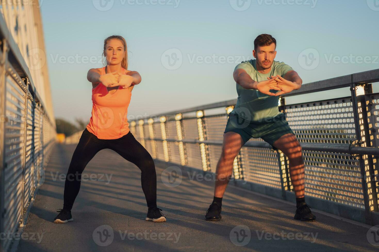 Friends exercising together photo