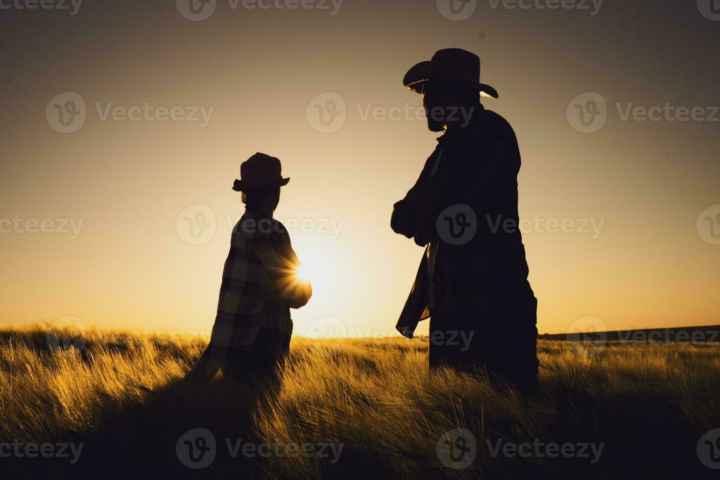 Farmer couple on their land and plantation photo