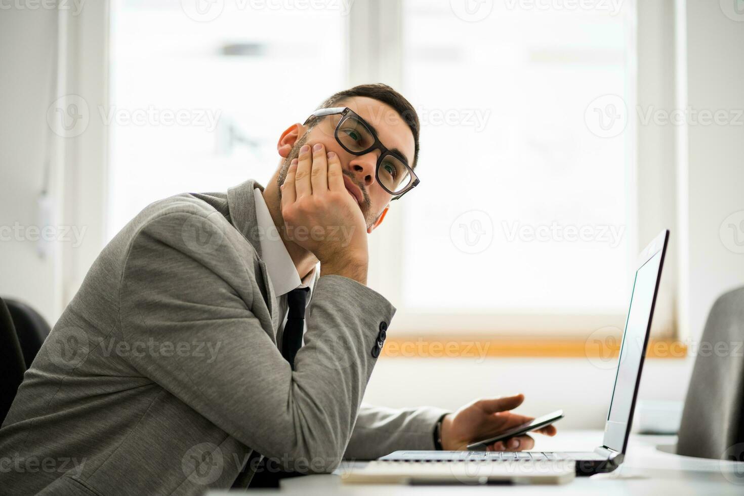 A business man working in his office photo