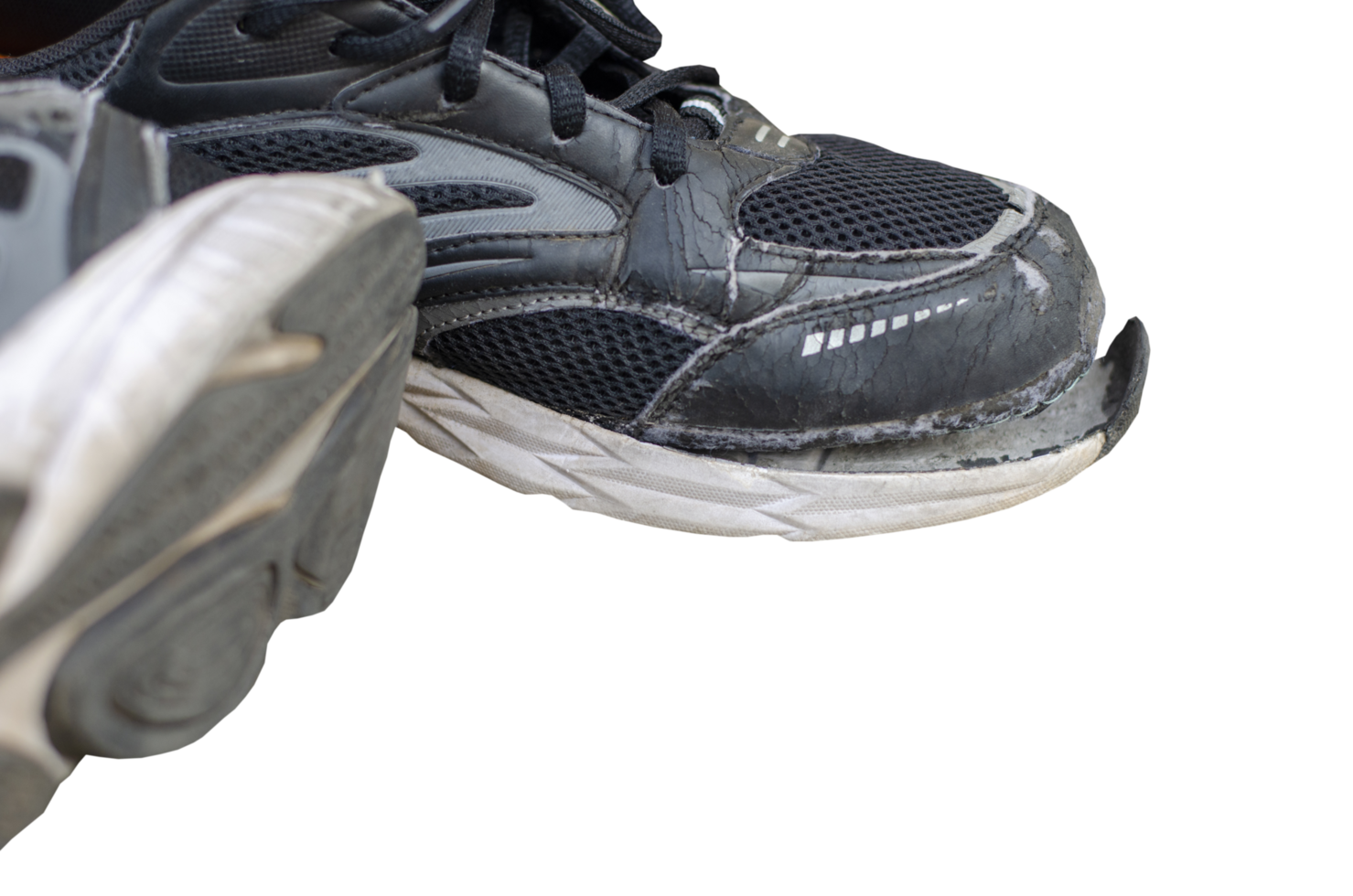 broken old black sneakers on transparent background png