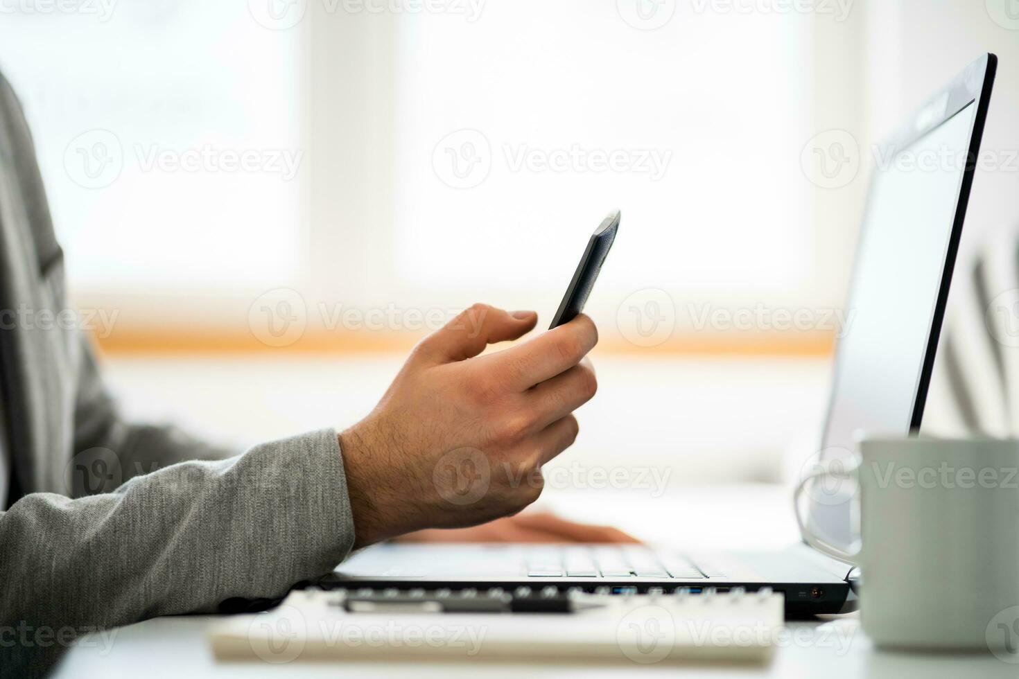 A business man working in his office photo