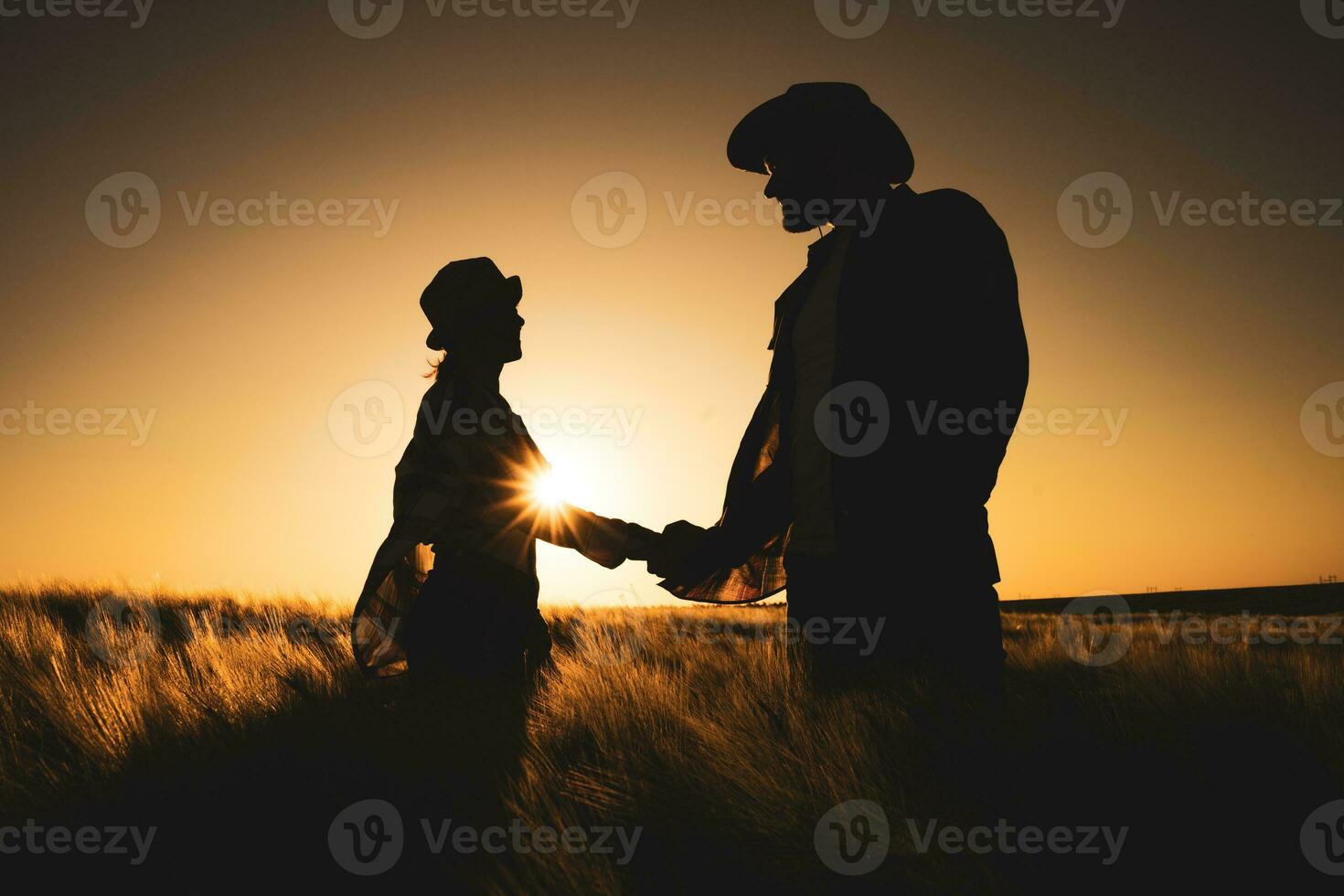 Farmer couple on their land and plantation photo