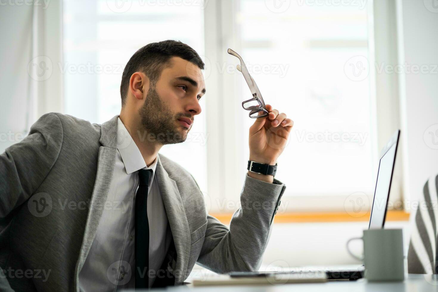 A business man working in his office photo