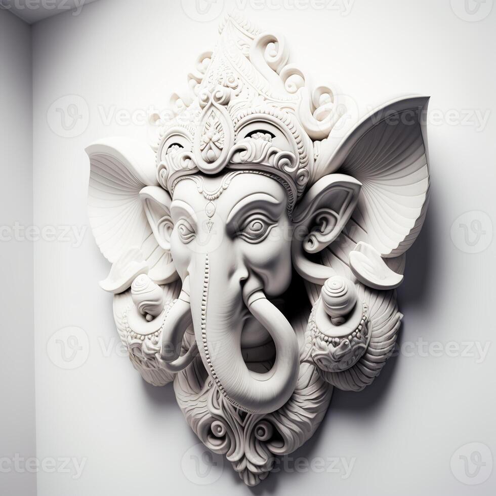 A white walled room with a statue of an Indian mythological God Lord Ganesha as Mural. . photo