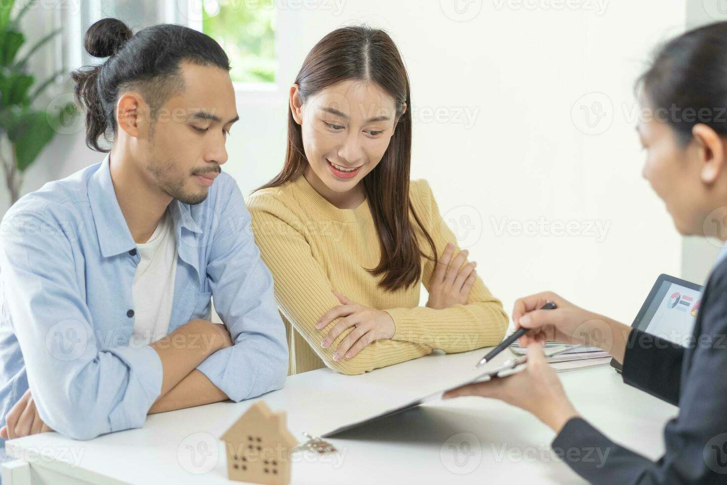 Happy asian couple client, tenant buyer home ,apartment, sign signature contract rental, purchase. Landlord, realtor agreement after bank approve mortgage, loan success or done. Property agent concept photo