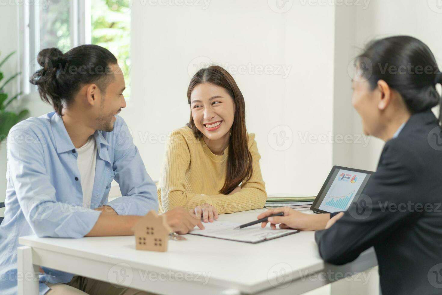 Happy asian couple client, tenant buyer home ,apartment, sign signature contract rental, purchase. Landlord, realtor agreement after bank approve mortgage, loan success or done. Property agent concept photo