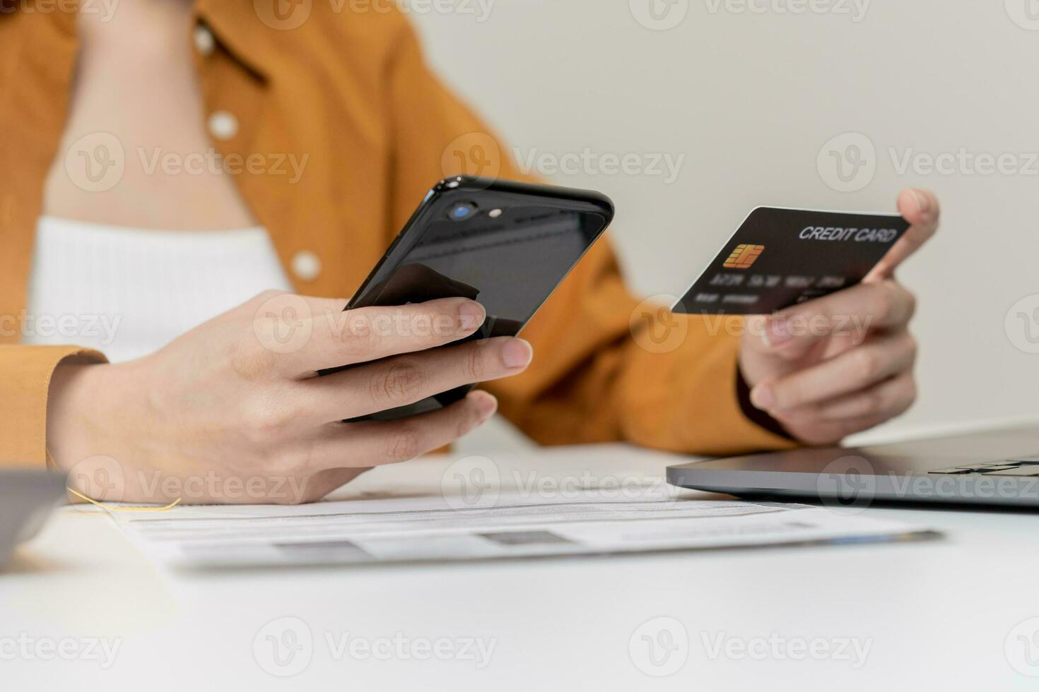 Convenience online internet banking, asian young woman hand in payment spending by scan qr code, use phone, mobile to transfer or pay money of credit card without cash at home. Technology of financial photo