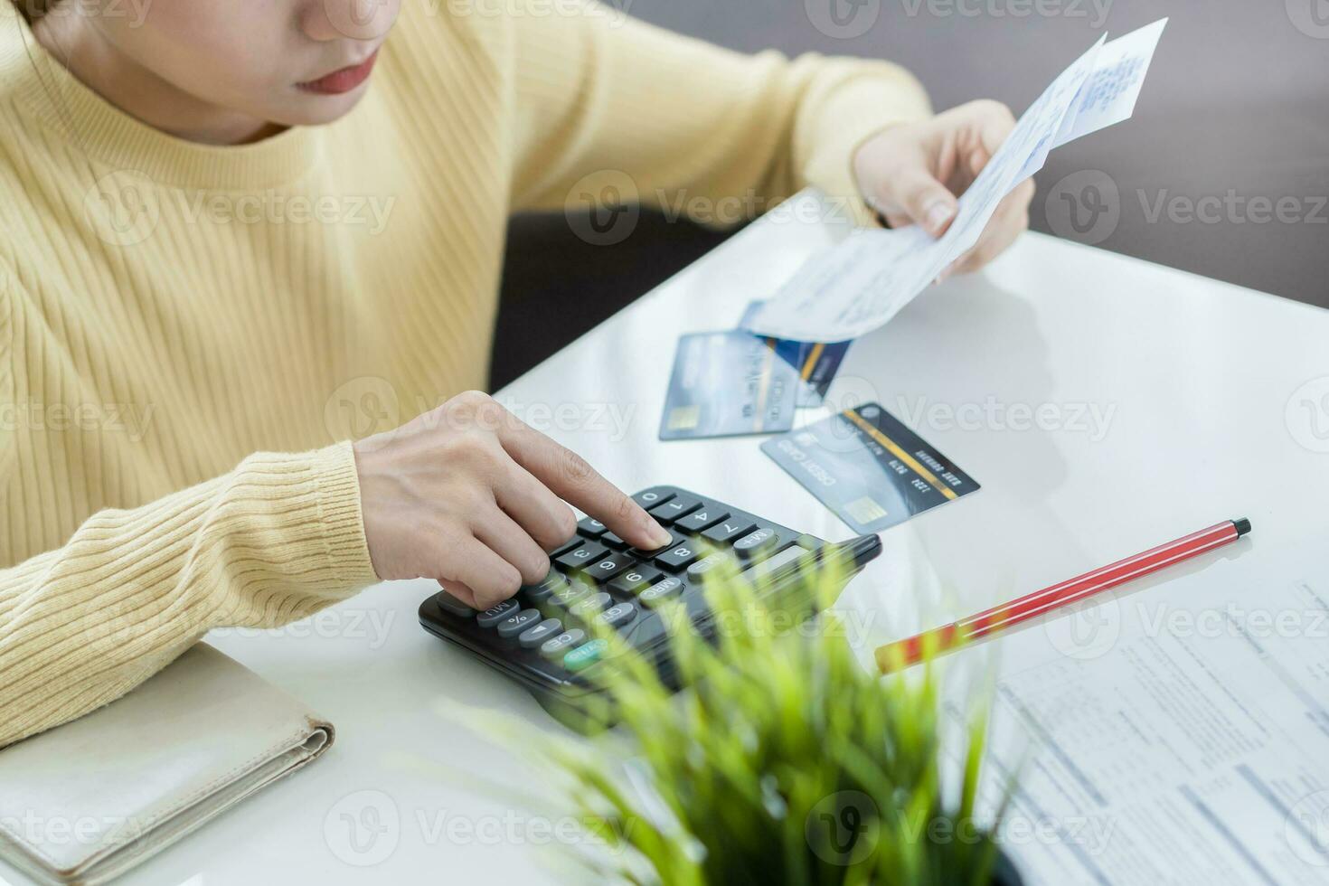 Financial owe asian woman, female sitting on floor home, stressed and confused by calculate expense from invoice or bill, have no money to pay, mortgage or loan. Debt, bankruptcy or bankrupt concept. photo