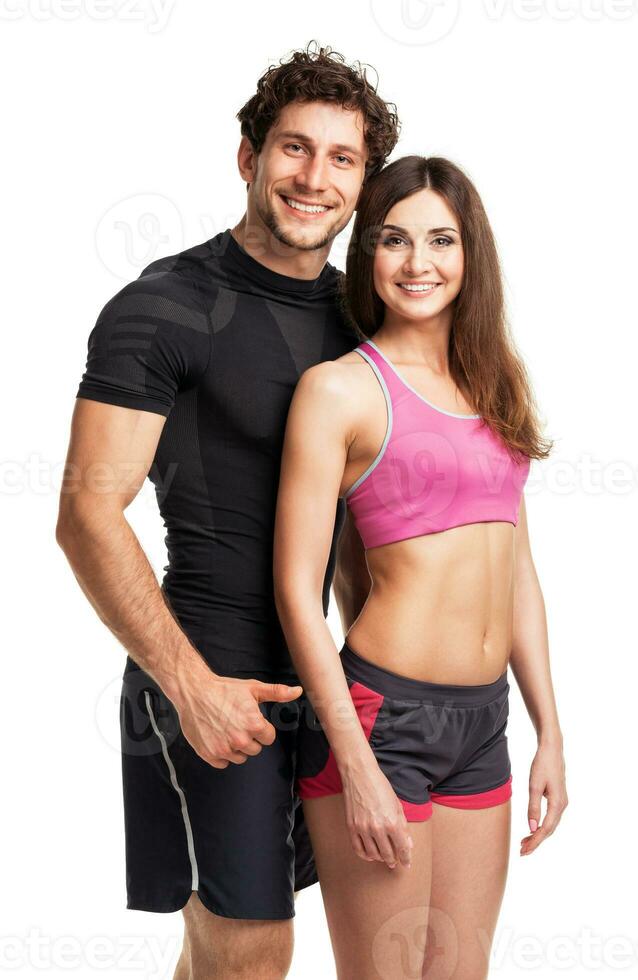 Sport couple - man and woman after fitness exercise on the white photo
