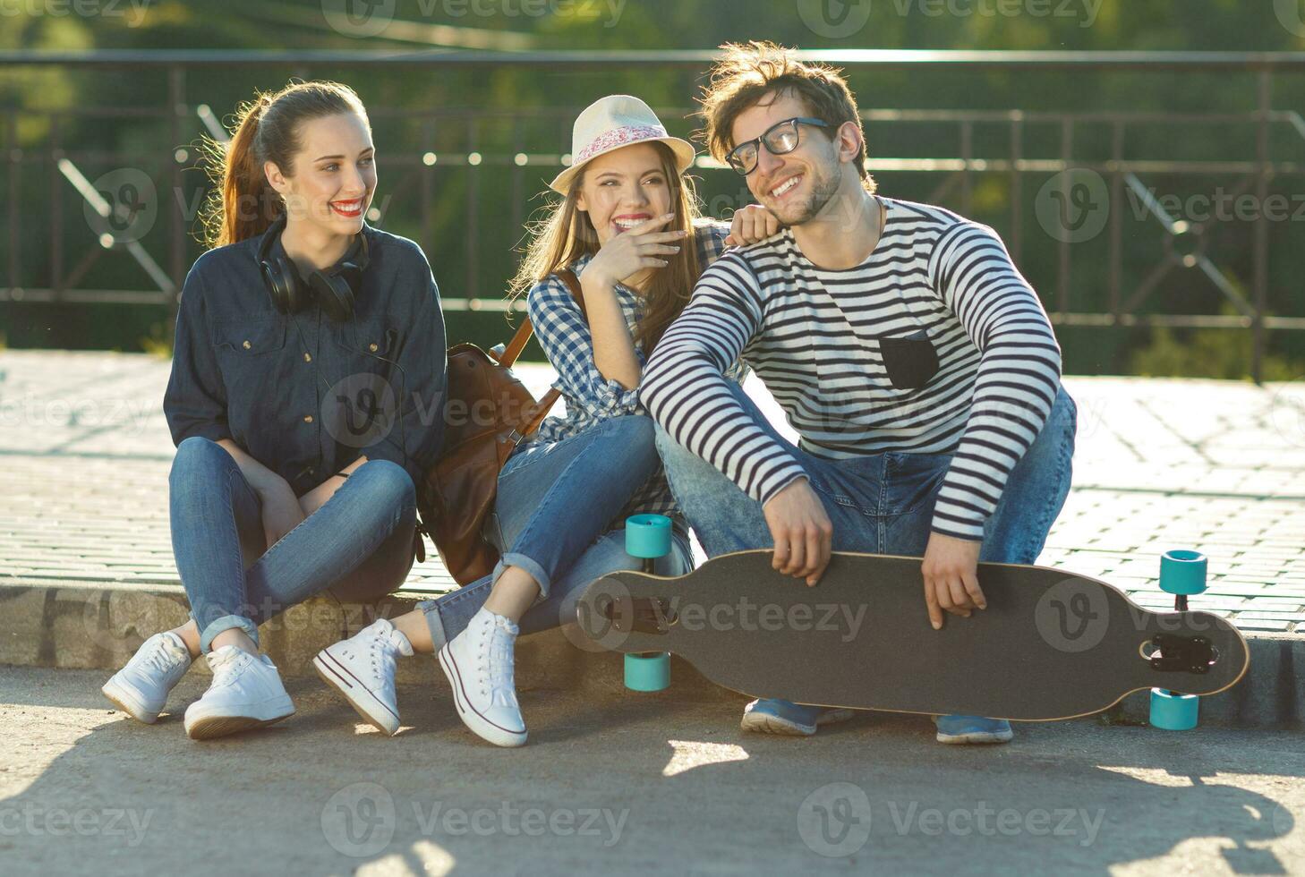 Smiling friends having fun outdoors photo