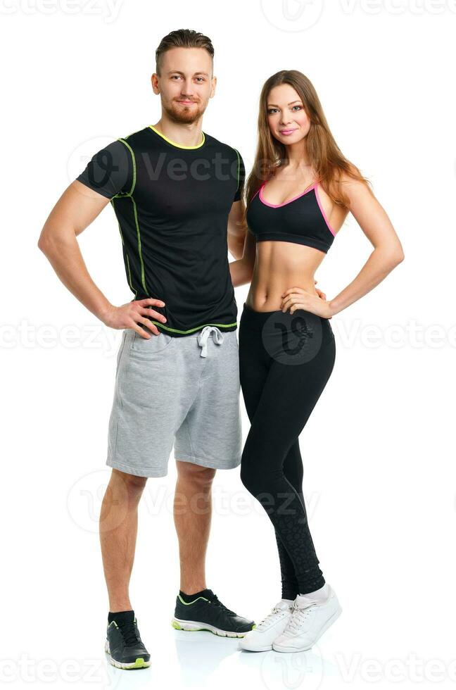 Athletic man and woman after fitness exercise on the white photo
