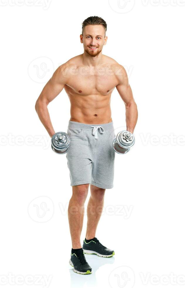 Sport man with dumbbells on the white photo