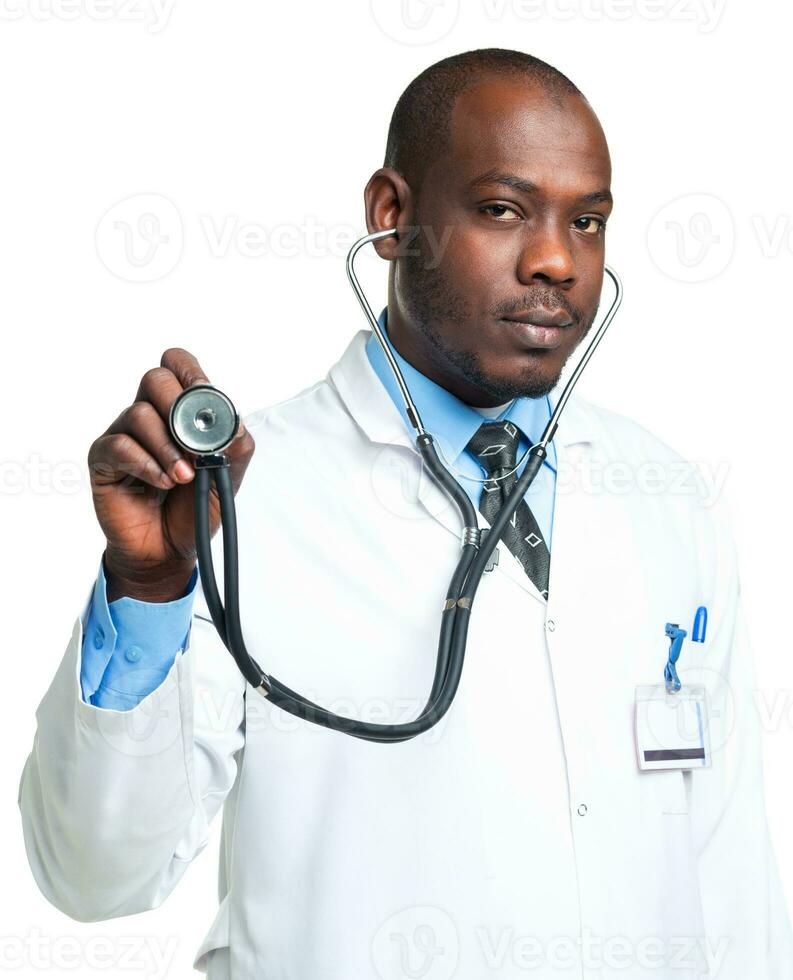Doctor with a stethoscope in the hands on white photo