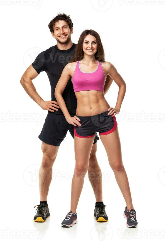 Athletic couple - man and woman after fitness exercise on white photo
