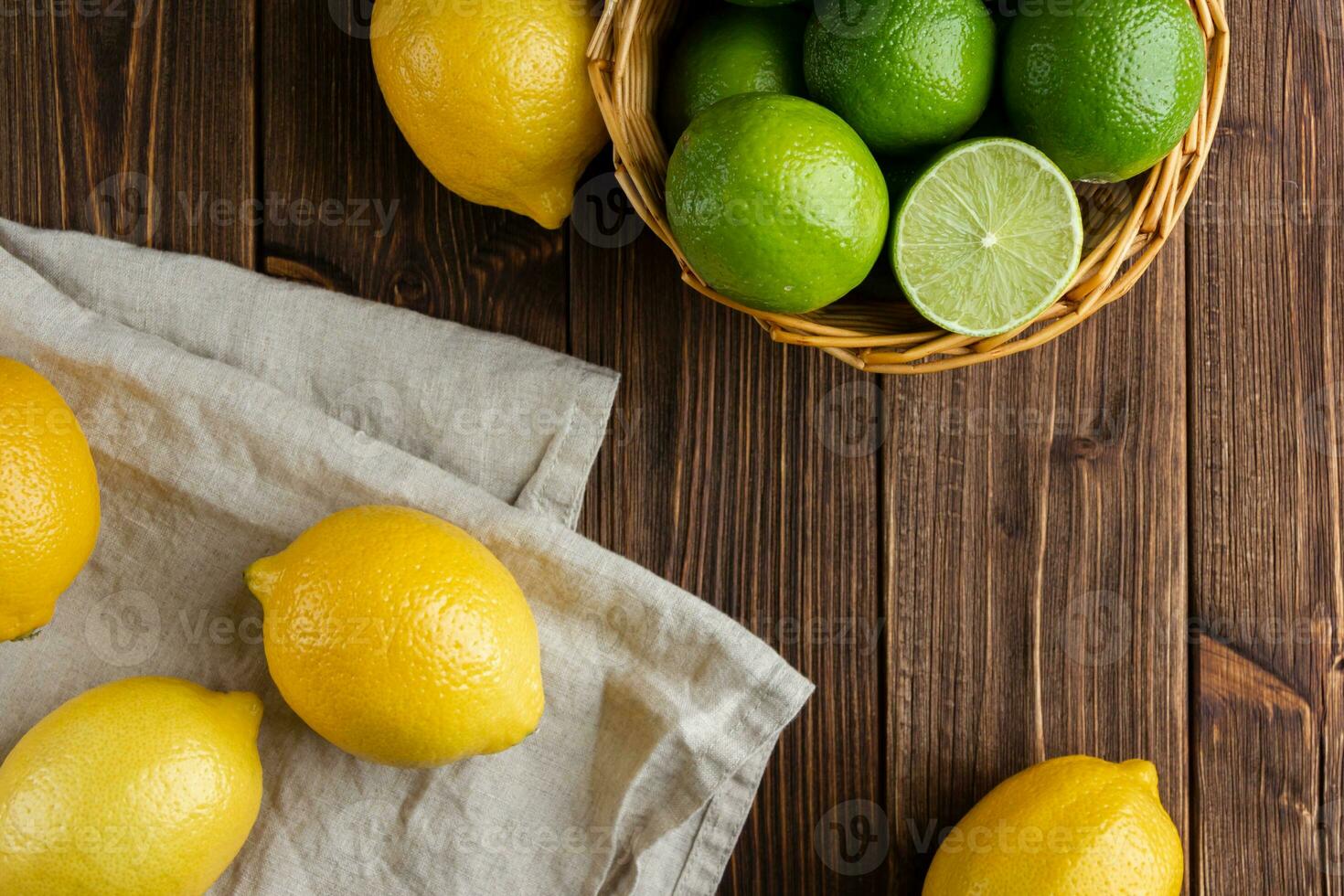 Limes and lemons in the basket. photo