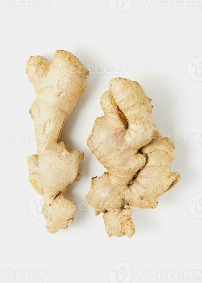 Ginger roots on white background. photo