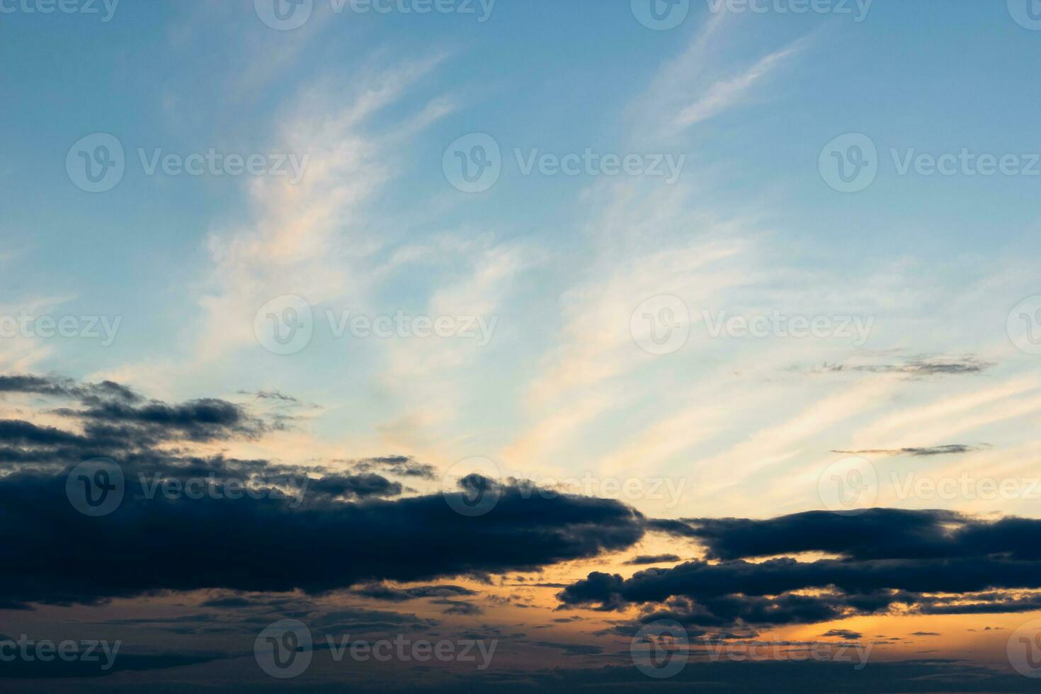 Sunset or sunrise. Blue sky with clouds. photo