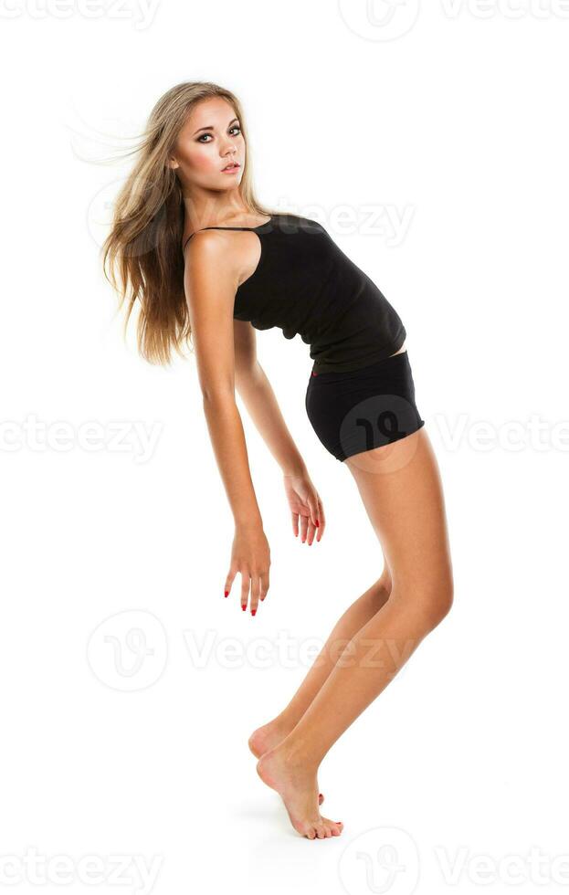 Young athletic girl on white background photo