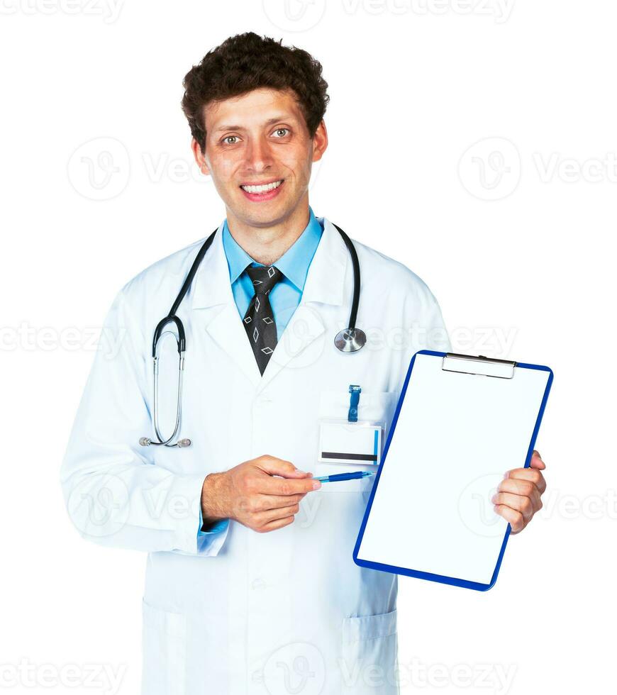 Young male smiling doctor showing clipboard with copy space for text on white photo