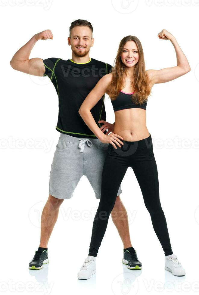 Athletic man and woman after fitness exercise on the white photo