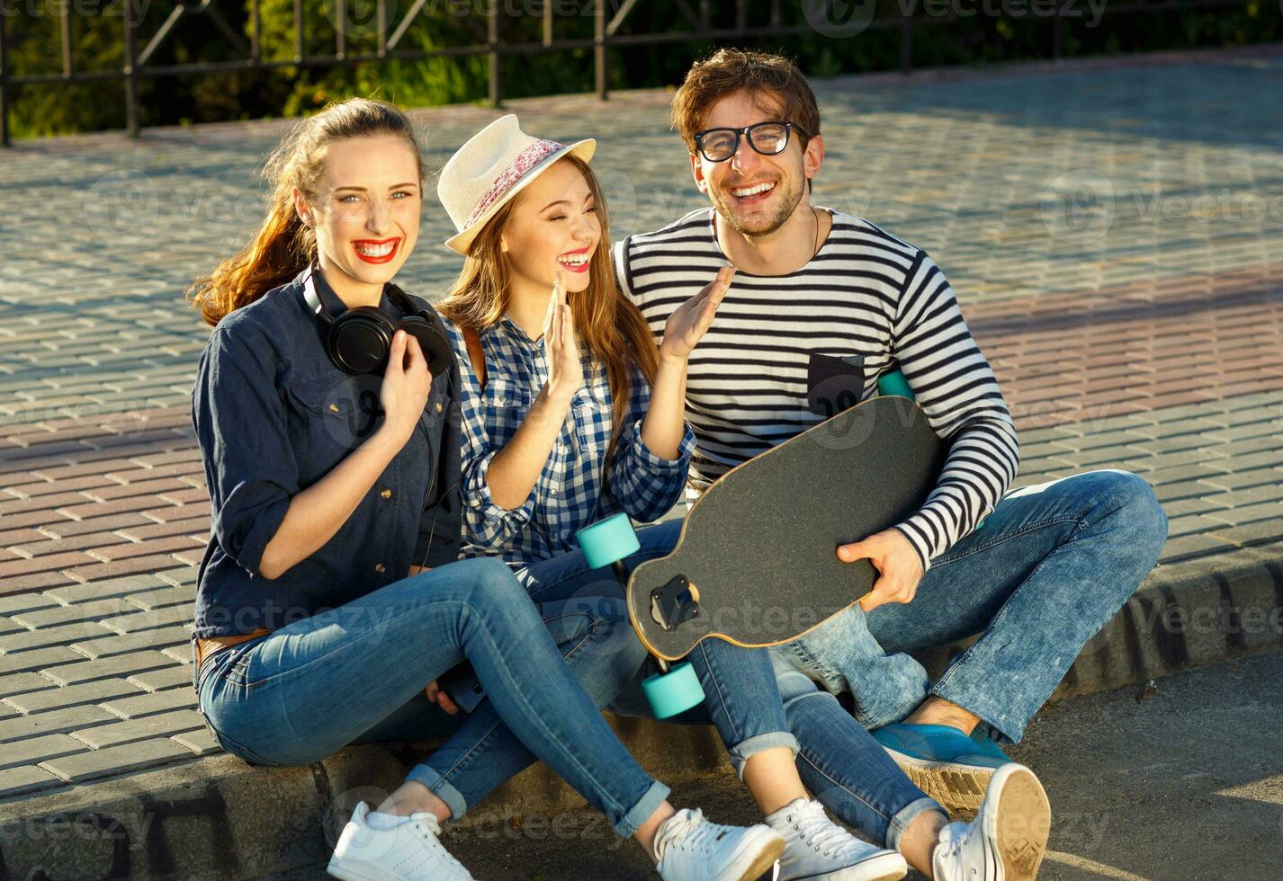 Smiling friends having fun outdoors photo