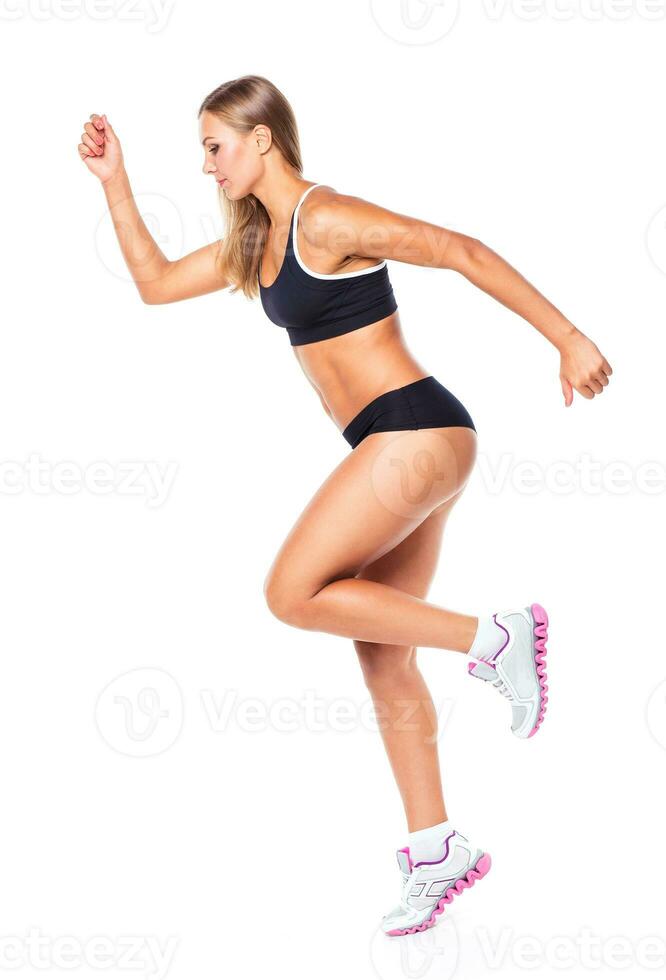 Young athletic girl on white photo