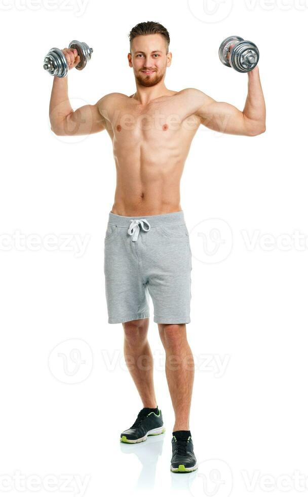 Sport man with dumbbells on the white photo