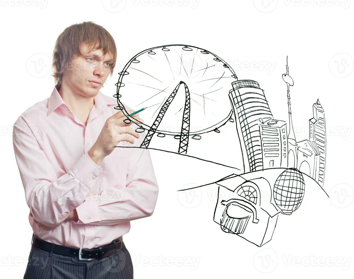 Businessman drawing a city photo