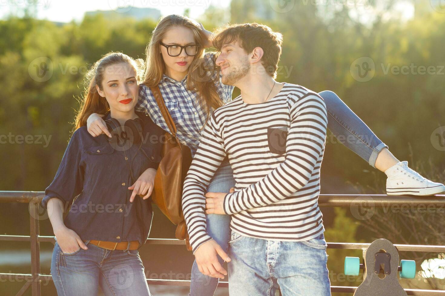 Smiling friends having fun outdoors photo