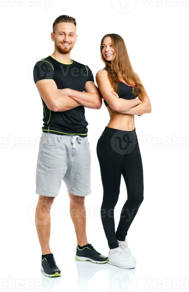 Athletic man and woman after fitness exercise on the white photo