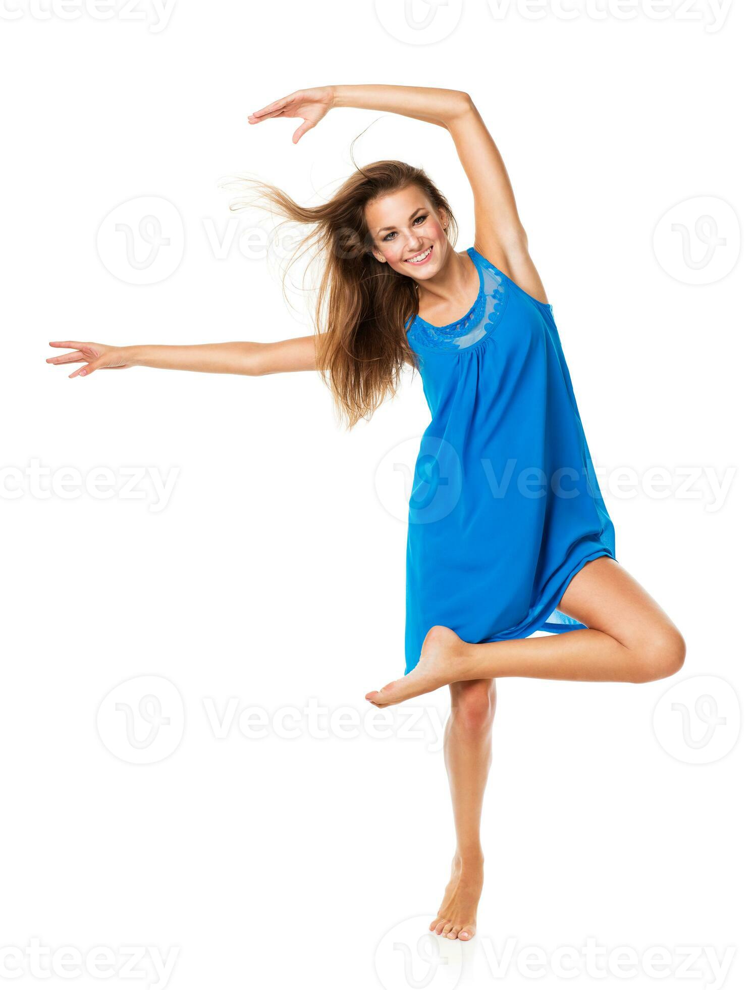 Young girl dancing in a blue dress on a white 23272871 Stock Photo at
