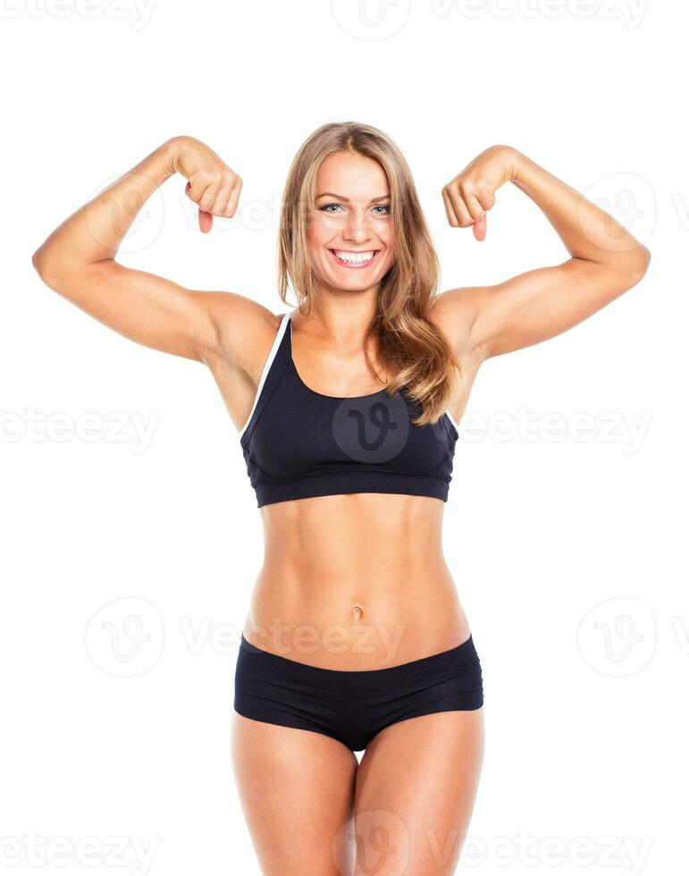 Young athletic girl on white background photo