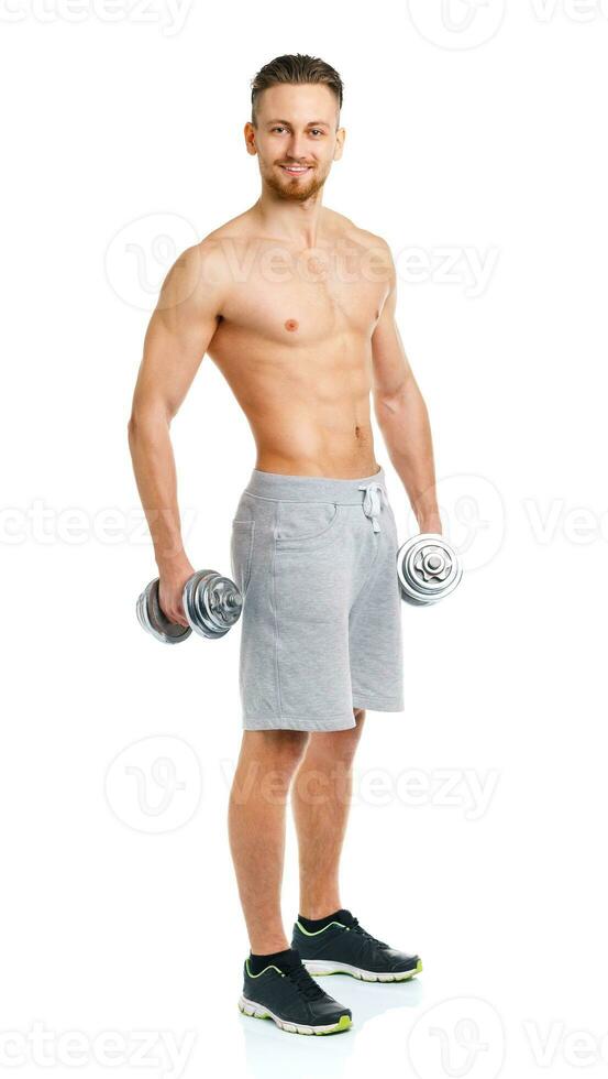 Sport man with dumbbells on the white photo