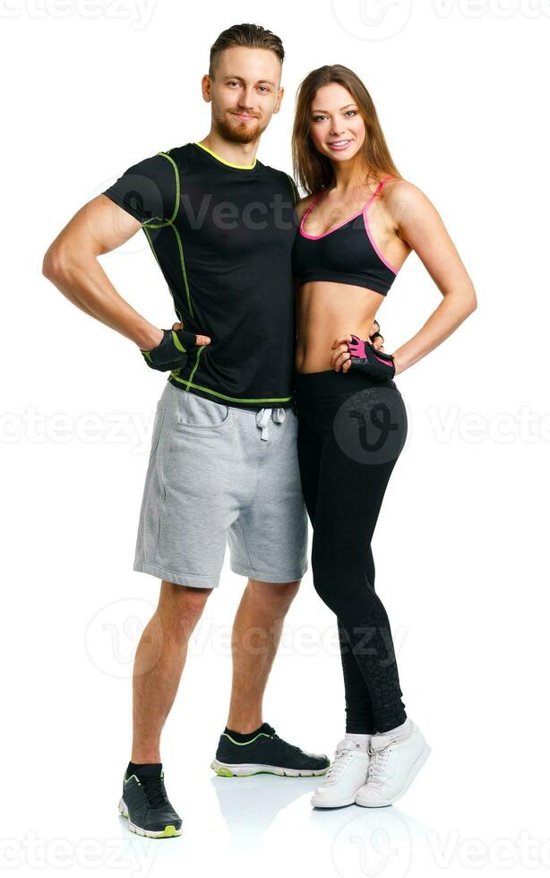 Sport couple - man and woman after fitness exercise on the white photo