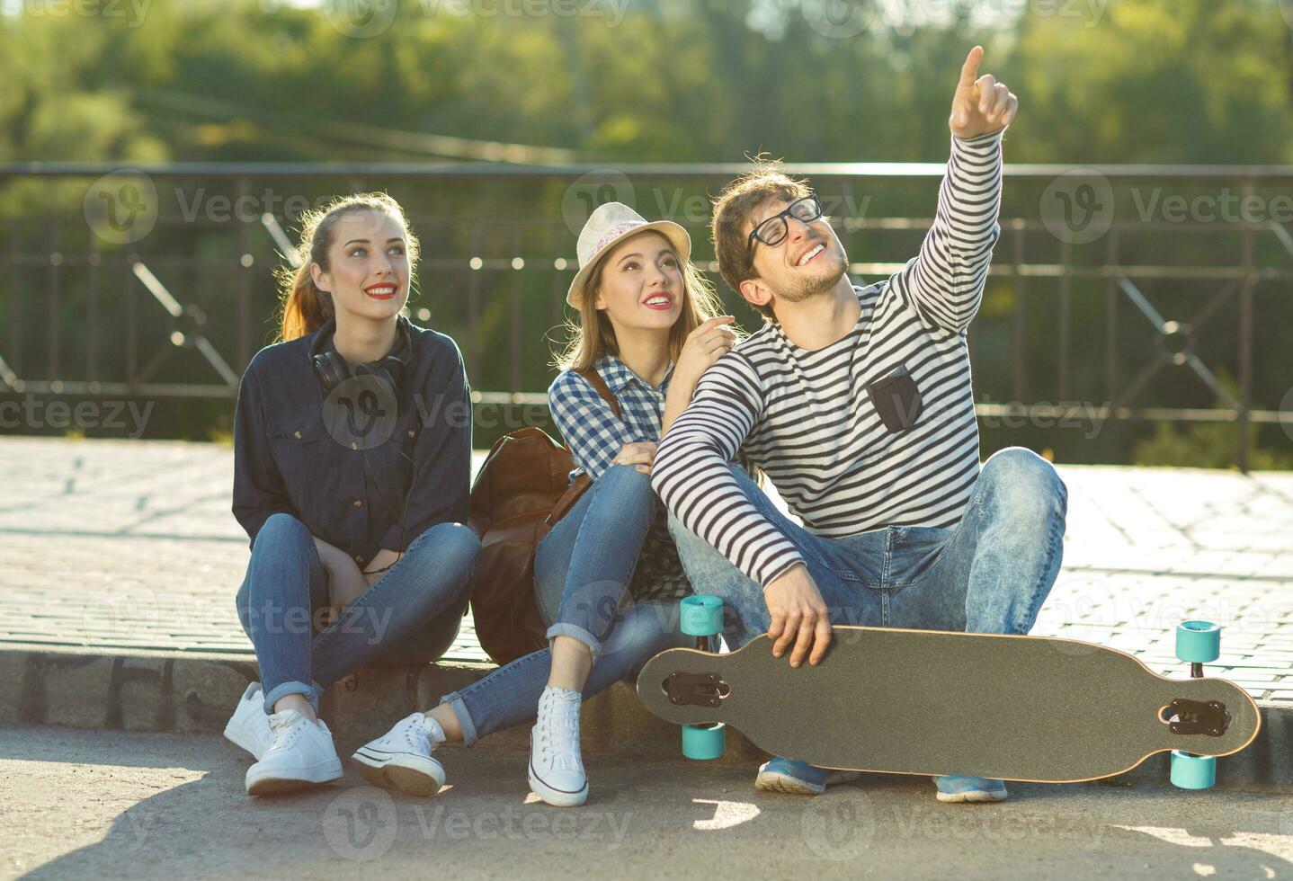 Smiling friends having fun outdoors photo