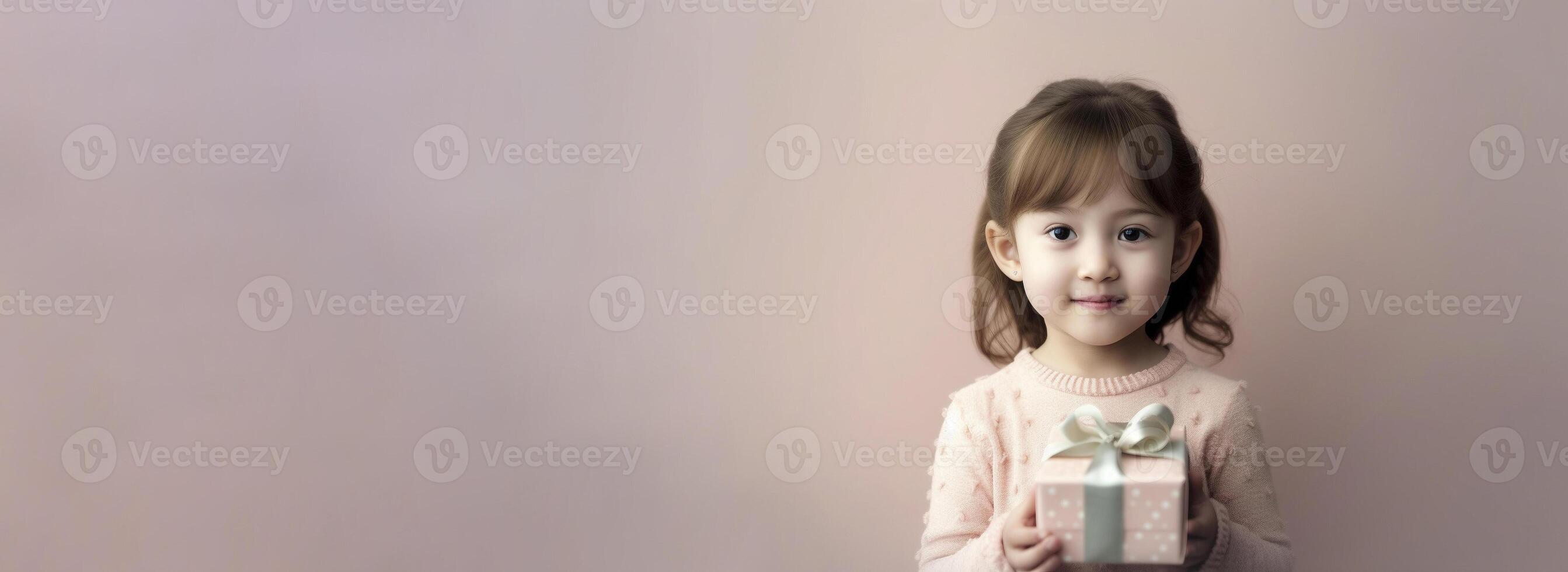 Cute little Asian girl with gift box on pink pastel background, created with photo