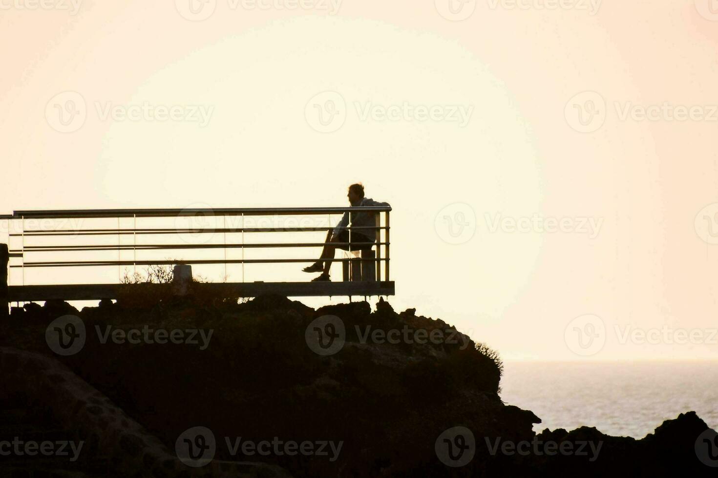 Landscape with silhouettes of people photo