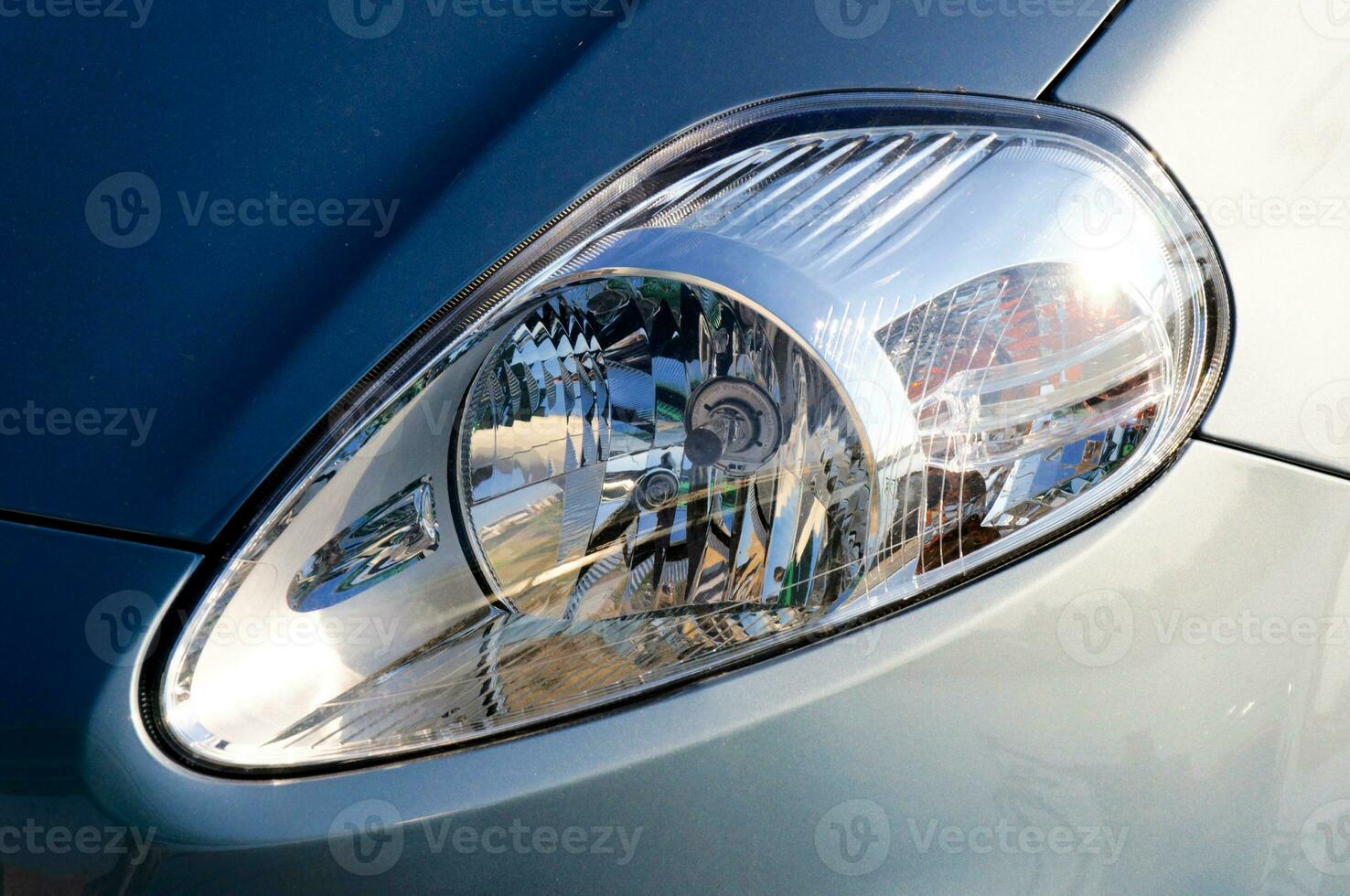 Car headlights close up photo