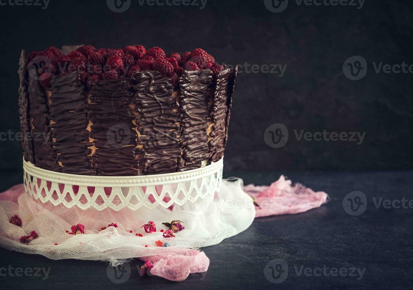 Dark chocolate cake with berries photo