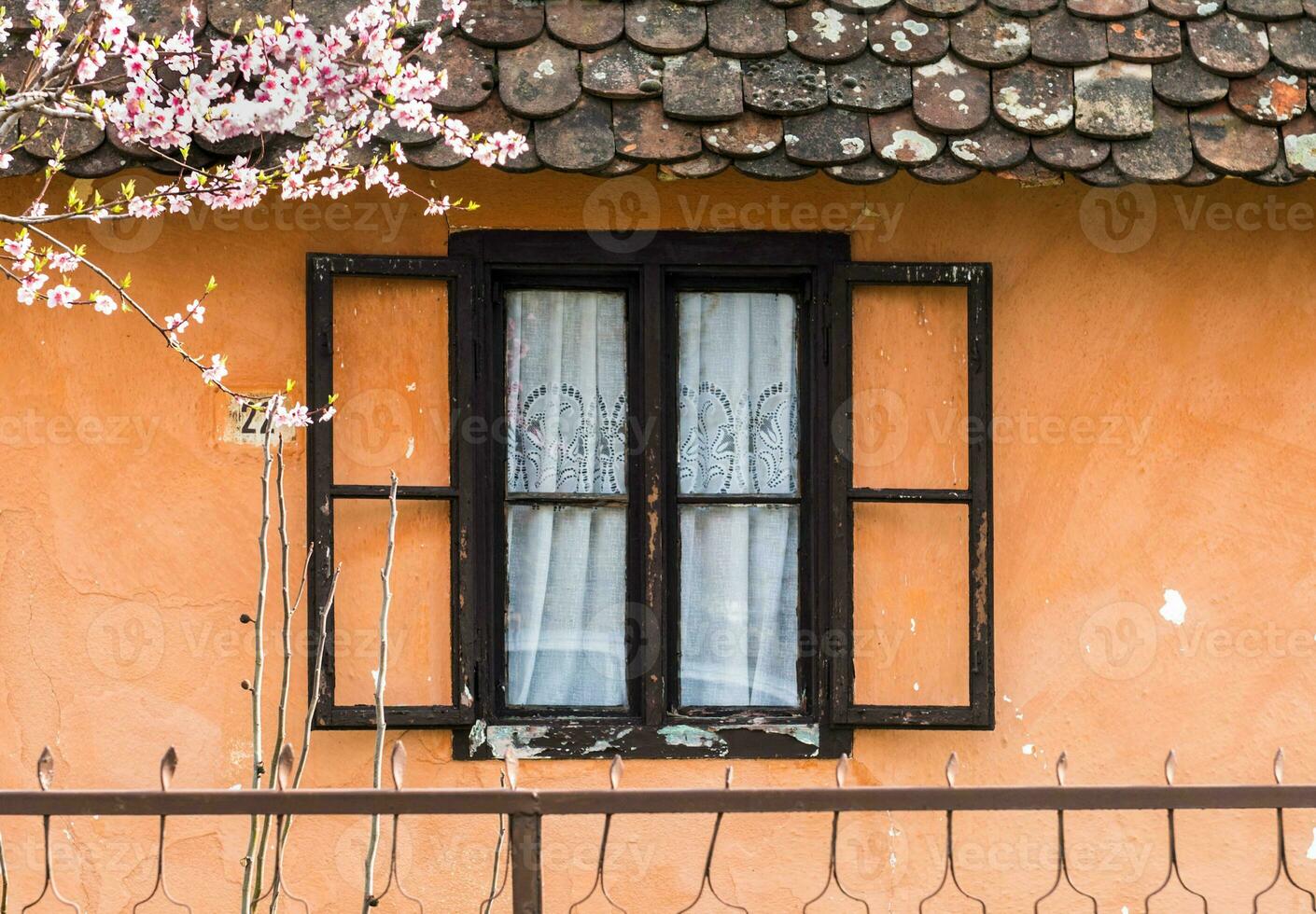 Old window on the house photo