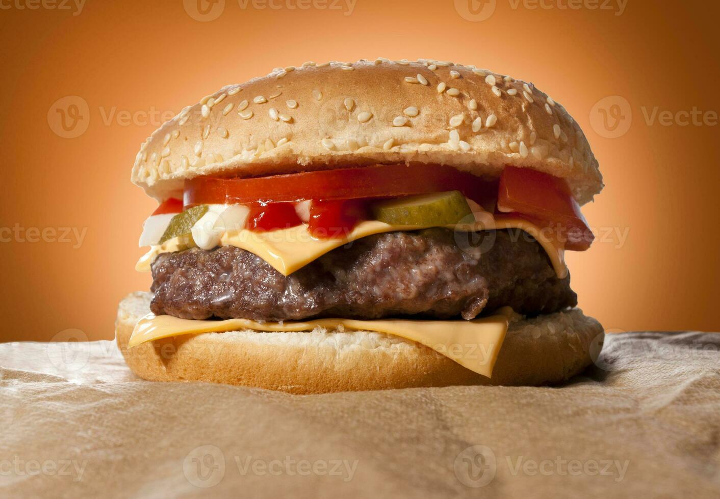 Served juicy cheeseburger photo