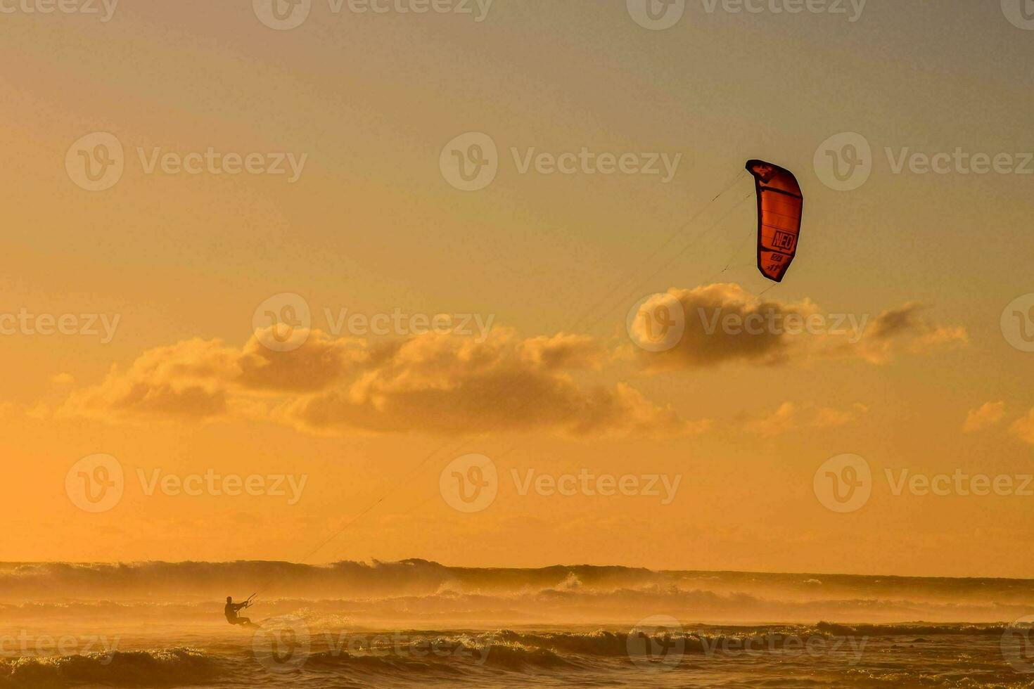 A man doing windsurf photo